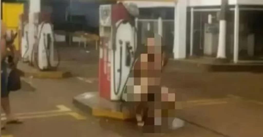 Video: sem chuveiro, caminhoneiro toma banho em torneira de posto
