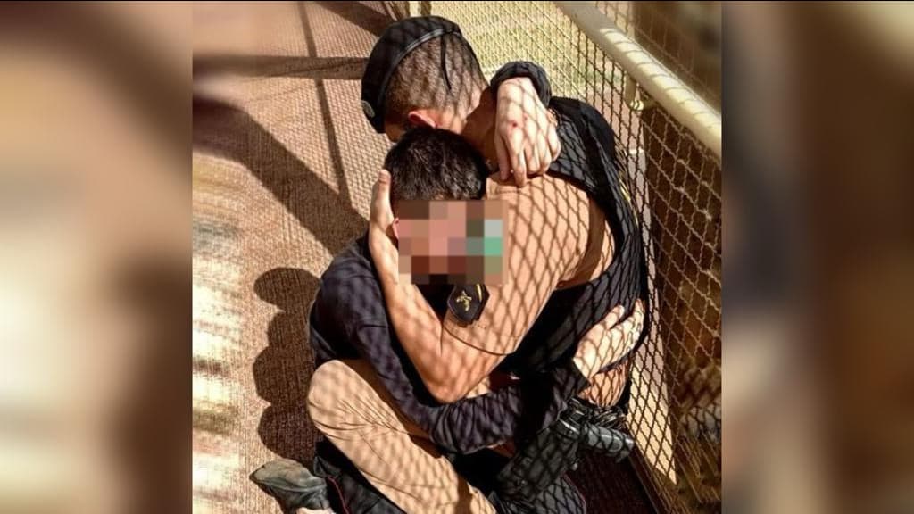 ABRAÇO DE GRATIDÃO: Policial convence jovem a não pular de passarela