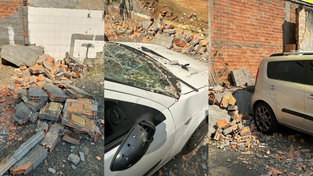 Vento forte derruba muro de estacionamento em cima de carros