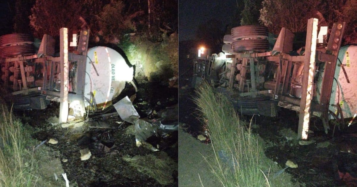 Motorista morre preso às ferragens após caminhão tombar e derramar carga na BR-470
