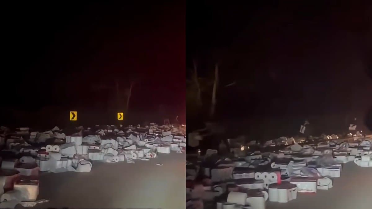 Carga de papel espalhada pela pista da SC-477, a noite, em Canoinhas