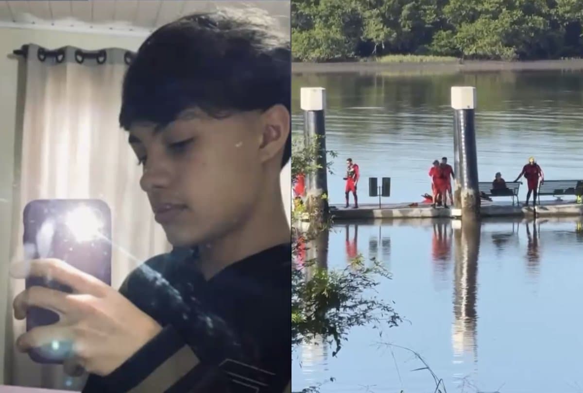 Jovem identificado como Enzo ao lado de bombeiros voluntários durante buscas no trapiche do cais do Espinheiros, em Joinville.