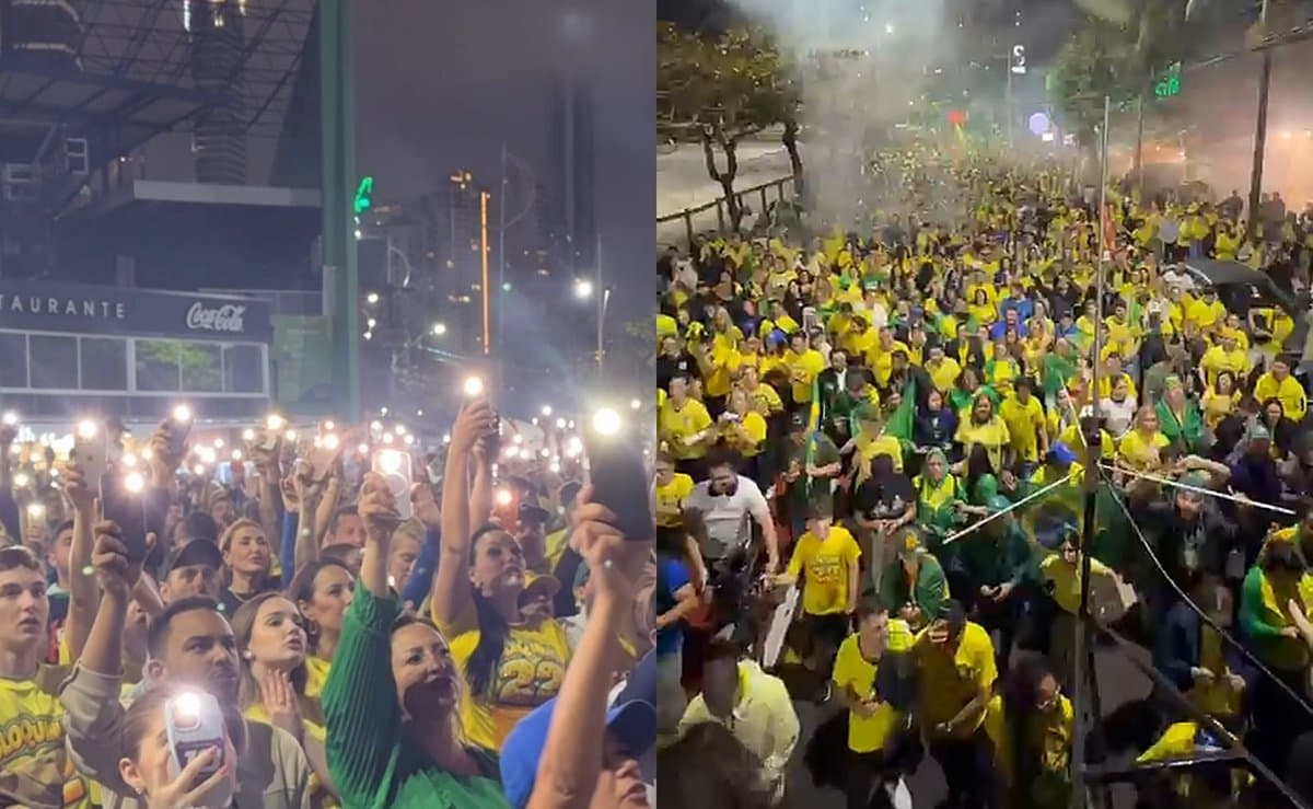 Cerca de 3 mil pessoas acendem a lanterna do celular e rezam o Pai-Nosso no Bloquinho 22 em Balneário Camboriú