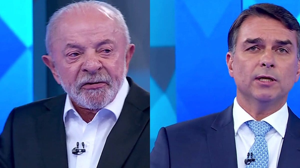 Lula provoca Flávio sobre salário mínimo e ouve: “dá com uma mão e tira com os nove dedos”