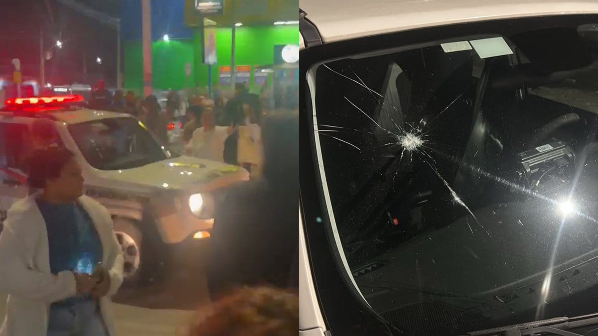 Manifestantes cercam viatura, quebram para-brisa e PM reage com bala de borracha em Florianópolis - Foto