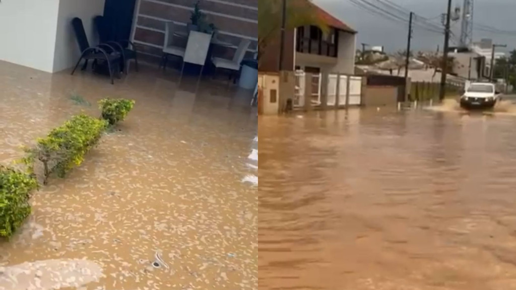 Rompimento de adutora alaga rua e casas em Penha