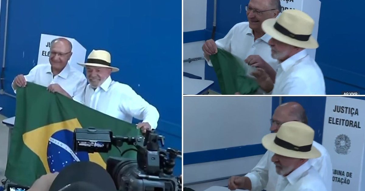 Lula embola e joga a bandeira do Brasil logo após posar para foto com Alckmin ao votar