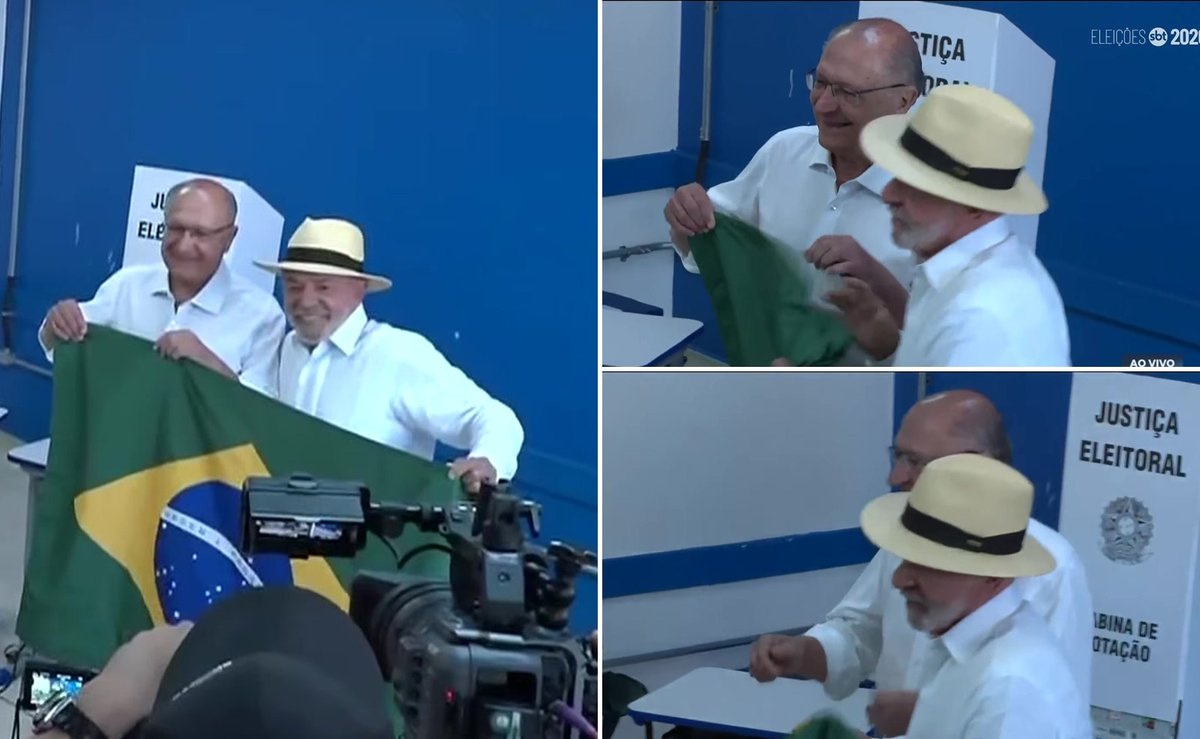 Lula embola e joga a bandeira do Brasil logo após posar para foto com Alckmin ao votar